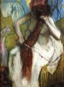 Edgar Degas Woman Combing Her Hair oil painting
